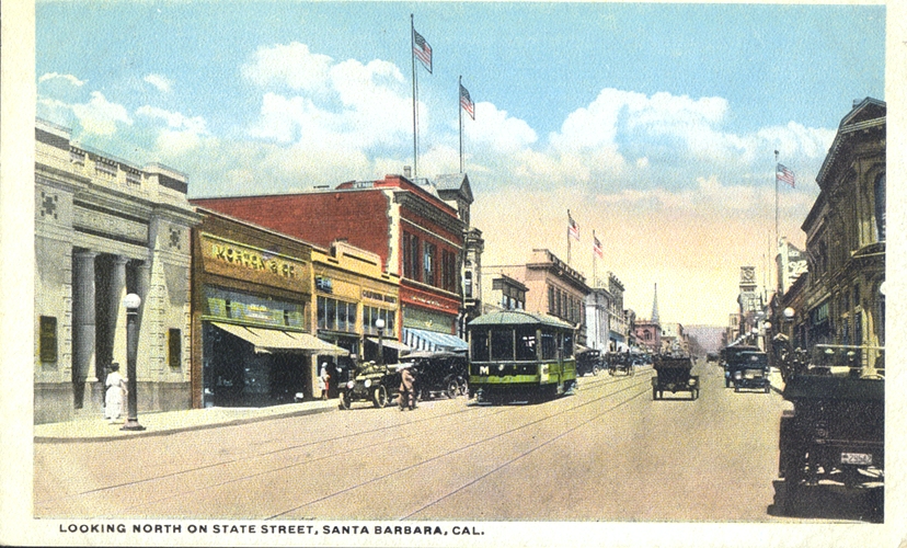 Postmarked 1907, this postcard shows the electric trolleys and early car traffic along State Street.